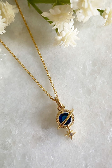Orion Navy Planet and Star Necklace Wisteria London